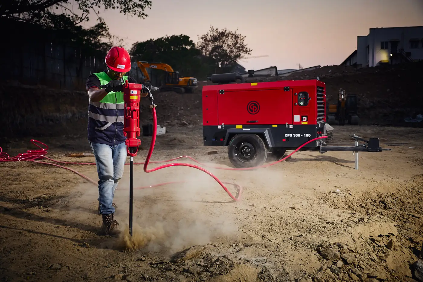 Chicago Pneumatic CPS 300-100 towable diesel air compressor working on a jobsite