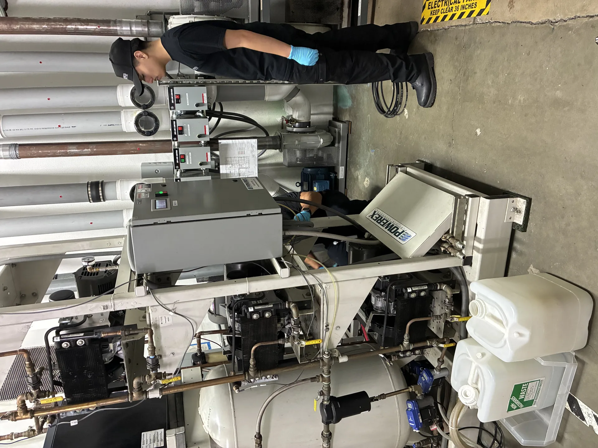 Toolytics Industrial technician performing on-site compressed air system service